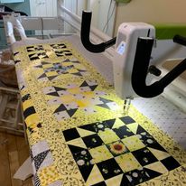 Unraveling the Threads of History: A Journey Through Longarm Quilting