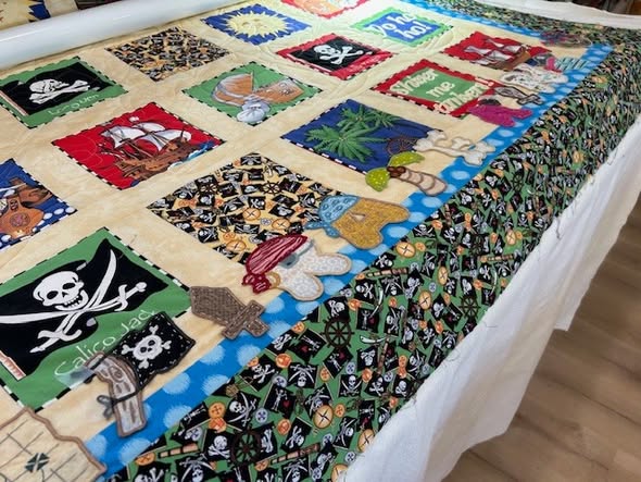 The Meaning and Gift of Quilts — Featuring August’s Pirate Quilt